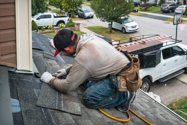 Professional Roofing technician working in Trafford, PA